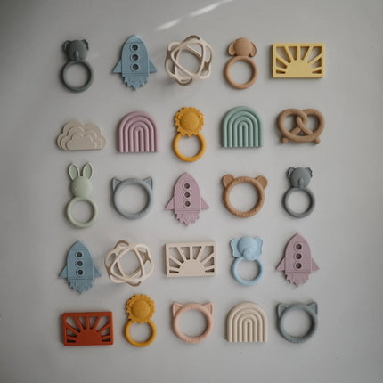 Mushie Bijtring Bal Shifting Sand koop je bij Babywinkel