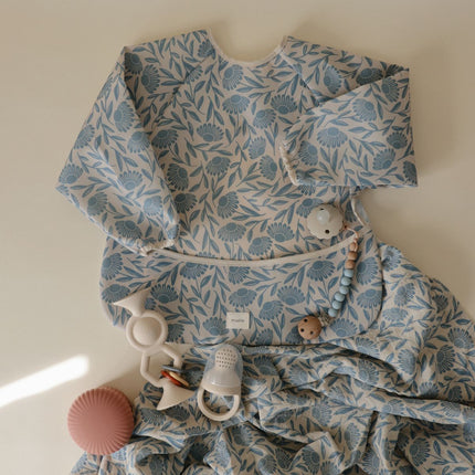 <tc>Mushie</tc> Bavaglino Blu Fiori Maniche Lunghe