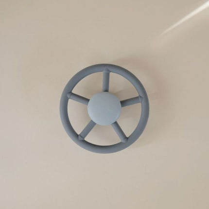 <tc>Mushie</tc> Giocattolo a ruota aspirante e rotante