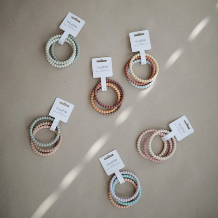 Mushie Bijtring Armband Siliconen Lilac/Cyan/Soft Peach 3st - Mushie - Babywinkel - 810052462028