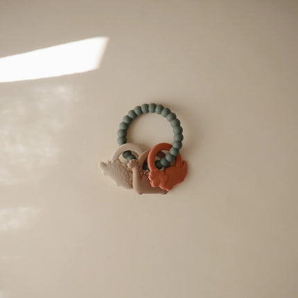 Mushie Bijtring Dino - Mushie - Babywinkel - 840355800234