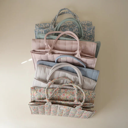 Mushie Draagbare Luier Organizer Pastel Blooms koop je bij Babywinkel